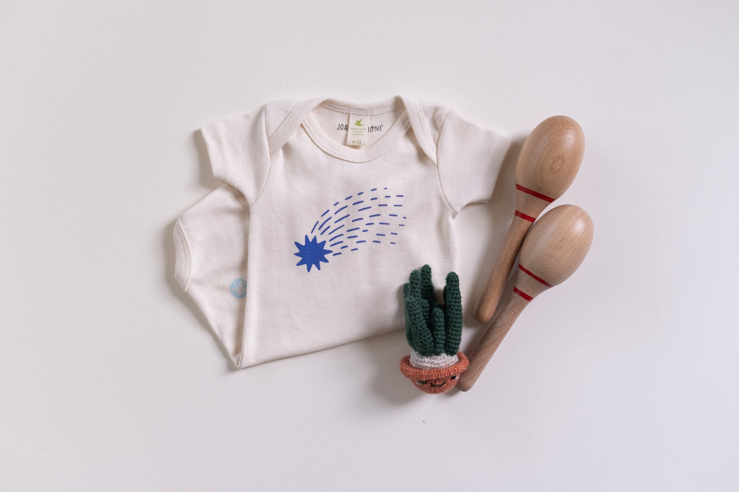 SHOOTING STAR | ORGANIC COTTON BABY ONESIE